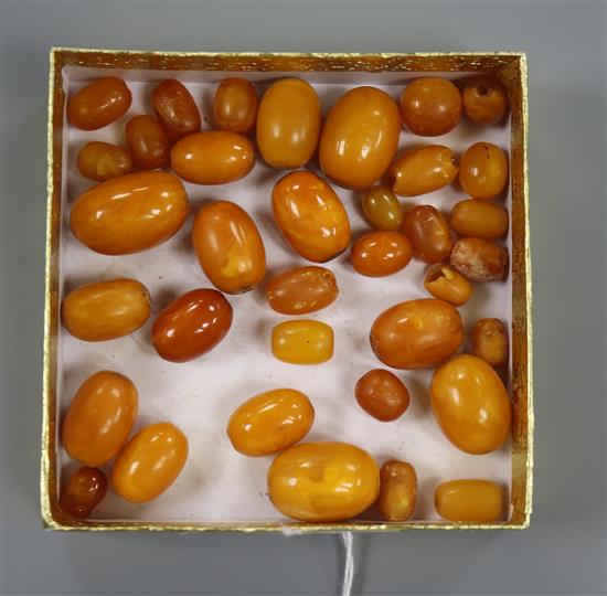 A group of assorted loose amber beads, gross weight 40 grams.